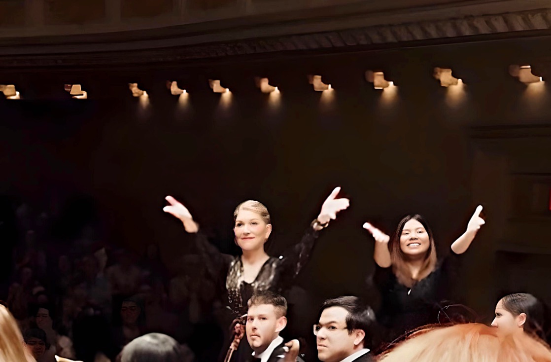 UNC choir members acknowledging audience at Carnegie Hall