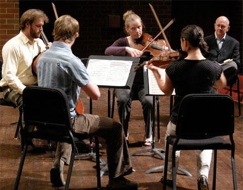 Guest artist William Preucil, concertmaster of the Cleveland Orchestra, coaching a UNC string quartet