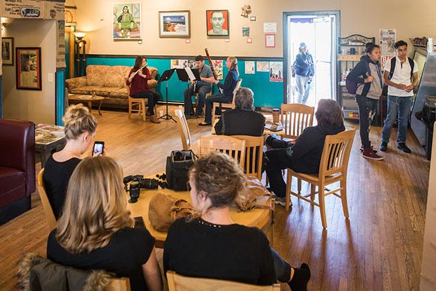 A chamber woodwind trio plays at a local coffee shop during the inaugural UNC Day of Music.