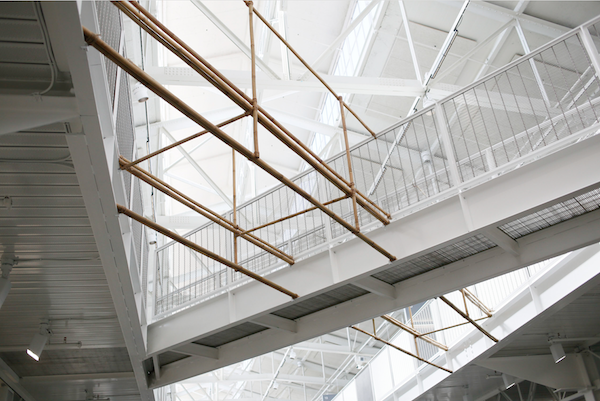 A Complete Crossing: Fort Mason Pier 2 Historic Railway & Footbridge Intersections (Detail), Site-specific bamboo, rope, and wire installation at Fort Mason Pier 2 SFAI Campus, 2018. Photo by Marco David Castaneda.